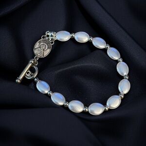 St. Peregrine silver tone oval pearl toggle bracelet